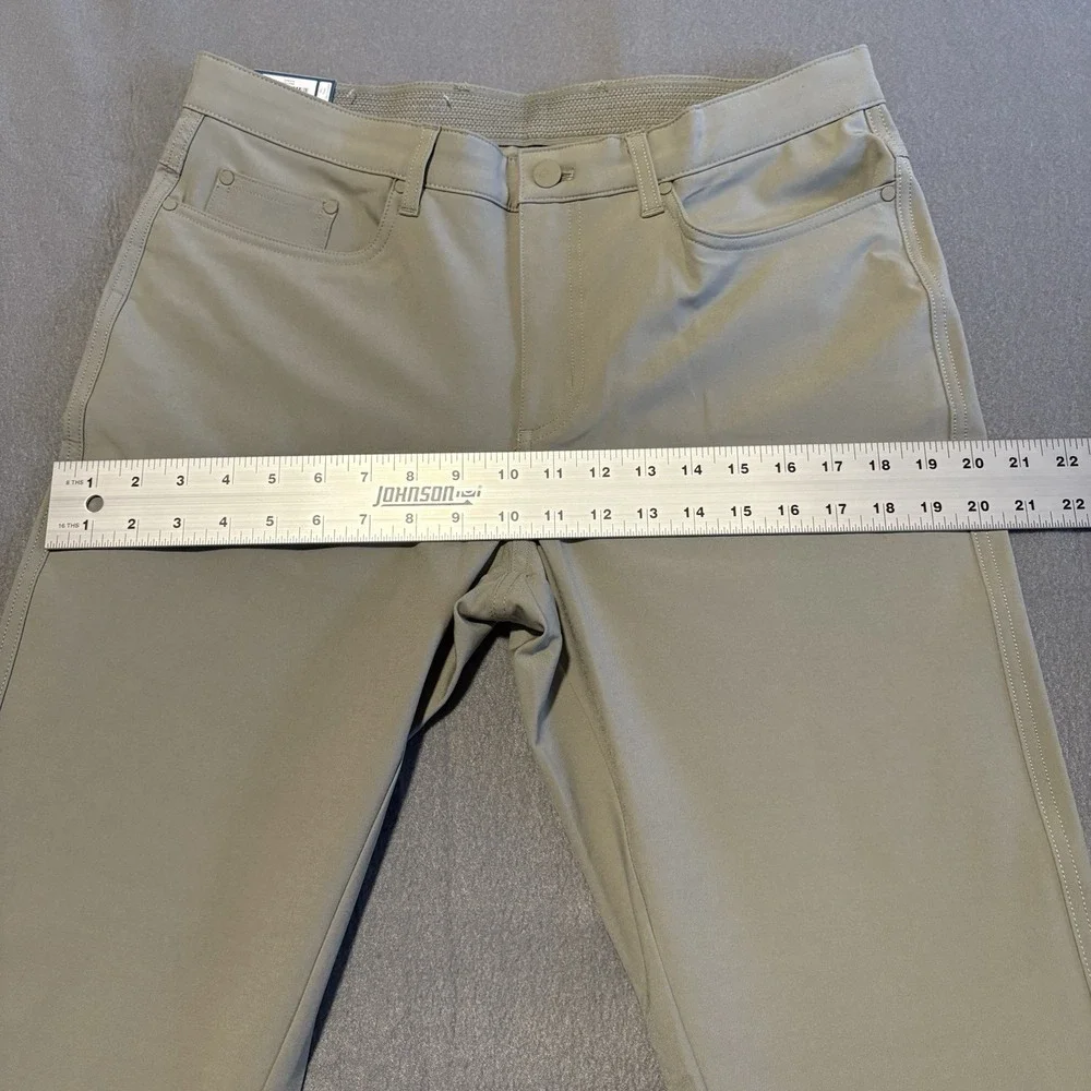Greg Norman Tech Pants Men 32x34 Green Performance Golf Travel 4-Way Stretch NEW